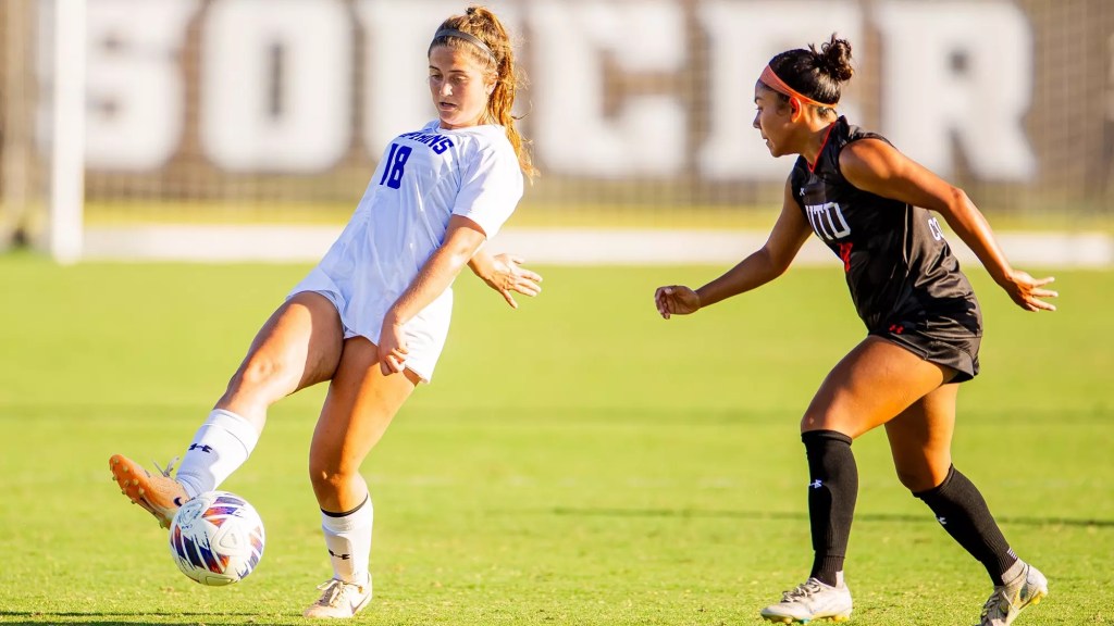 Brooke White playing midfield for Christopher Newport University